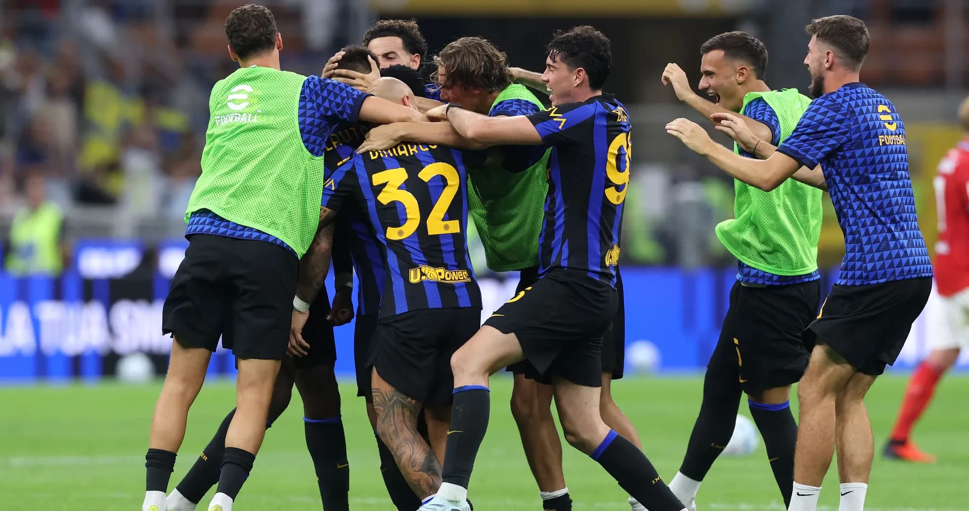 Players celebrating a goal during a match
