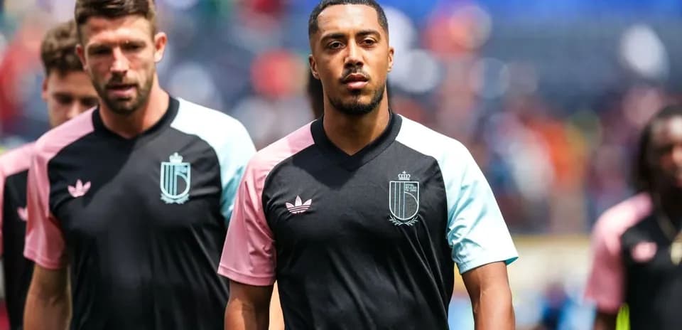 Players walking onto the field in training kits