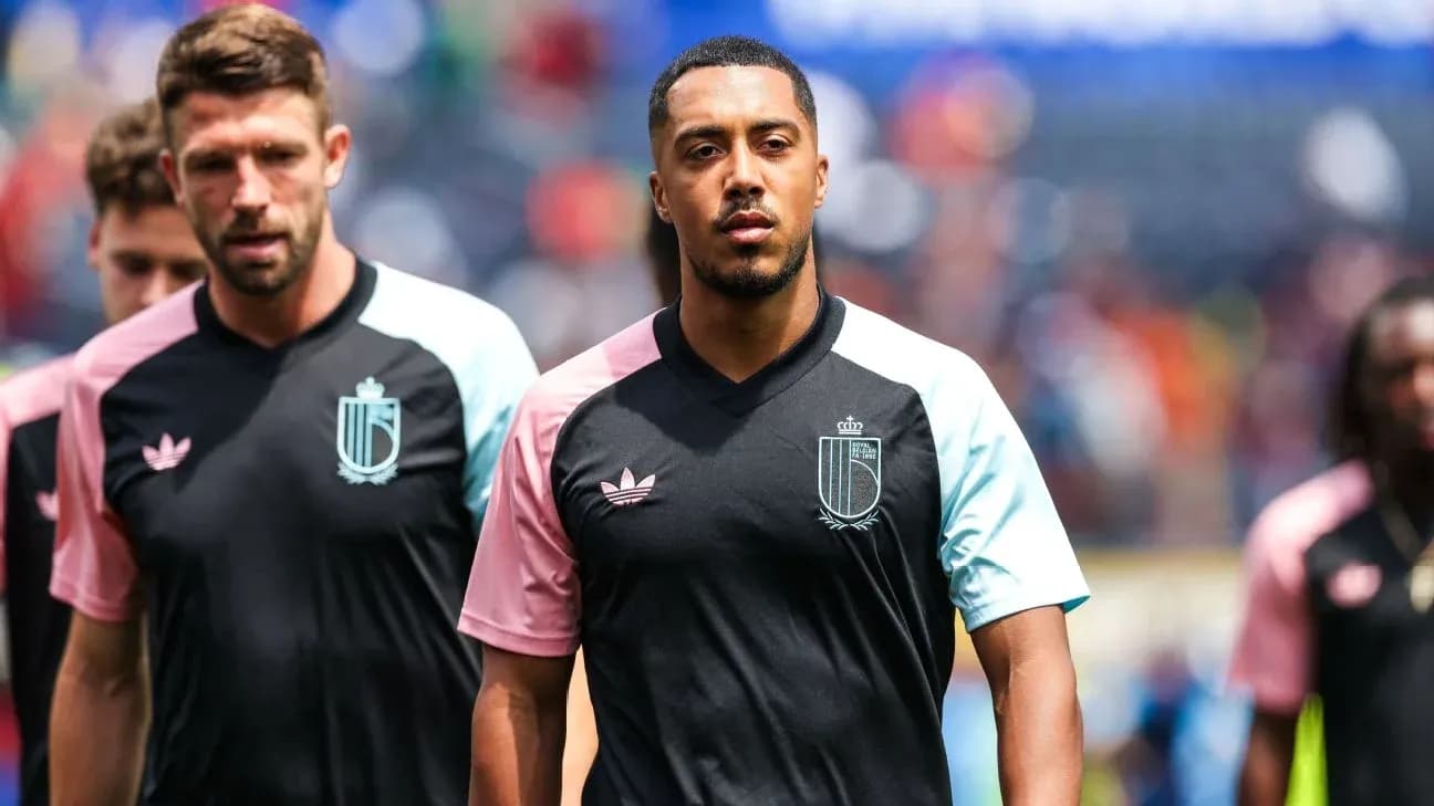 Players walking onto the field in training kits