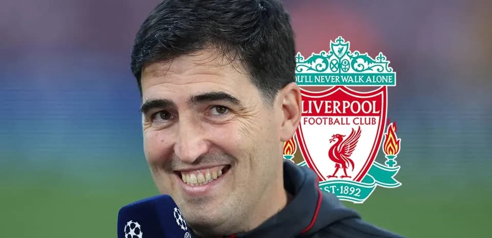 Spokesperson smiling with Liverpool logo in background