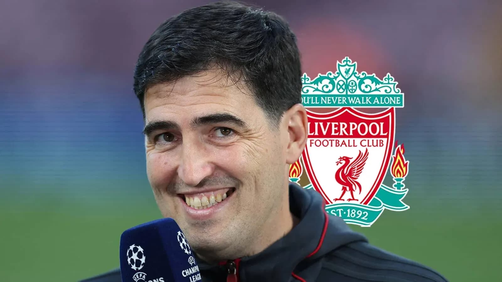 Spokesperson smiling with Liverpool logo in background