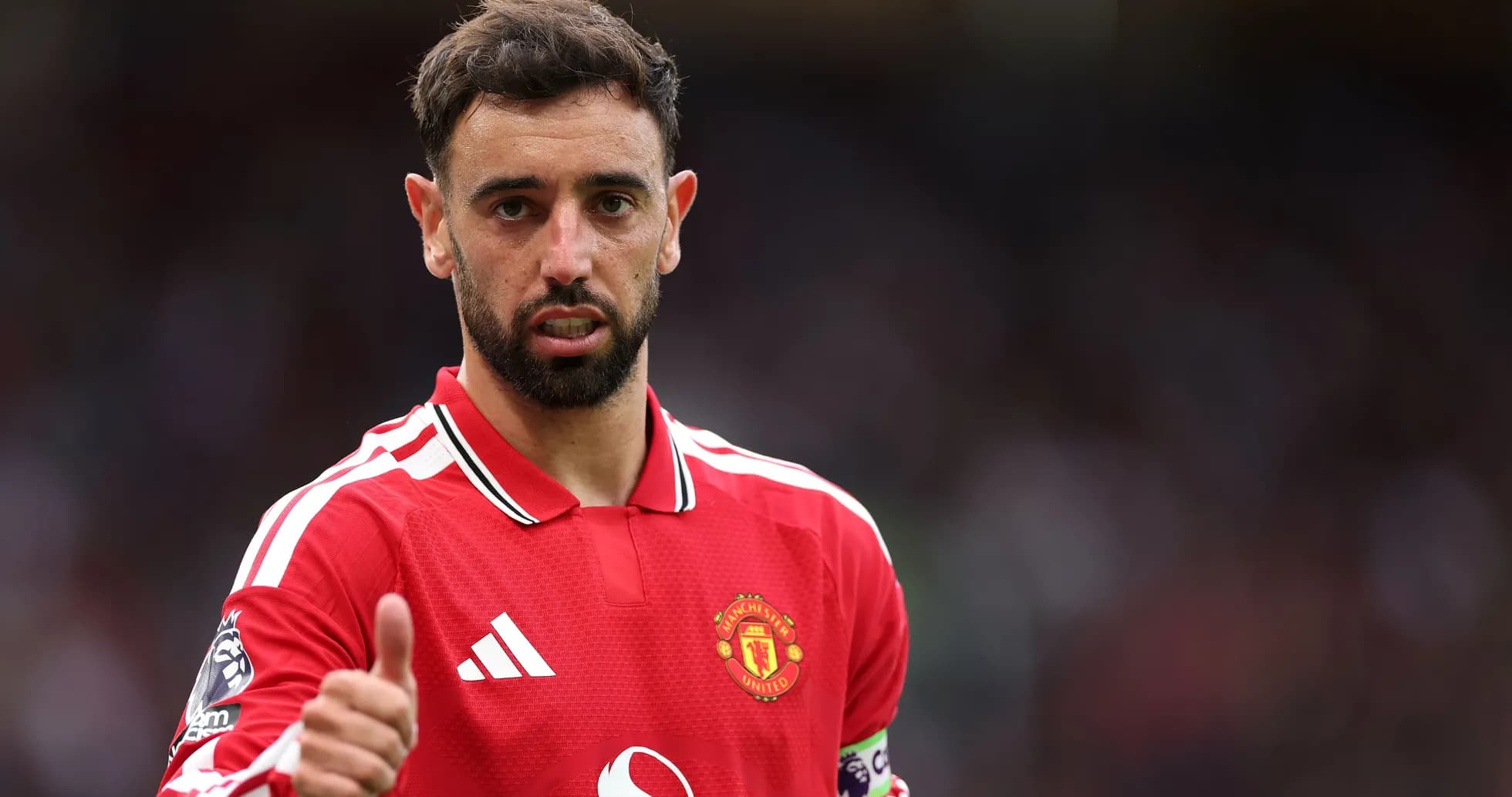 Bruno Fernandes in Manchester United jersey giving thumbs up