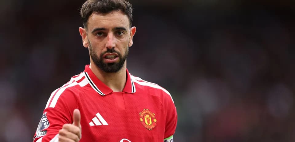 Bruno Fernandes in Manchester United jersey giving thumbs up