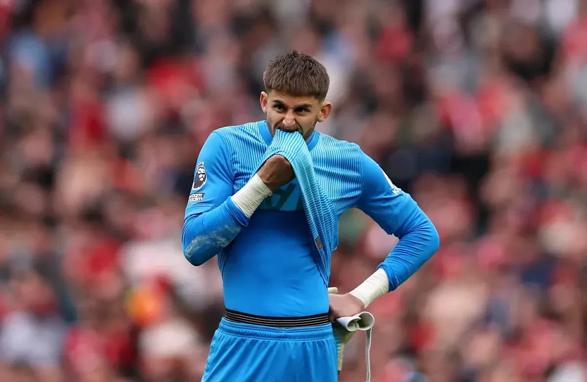 Goalkeeper biting jersey during a match