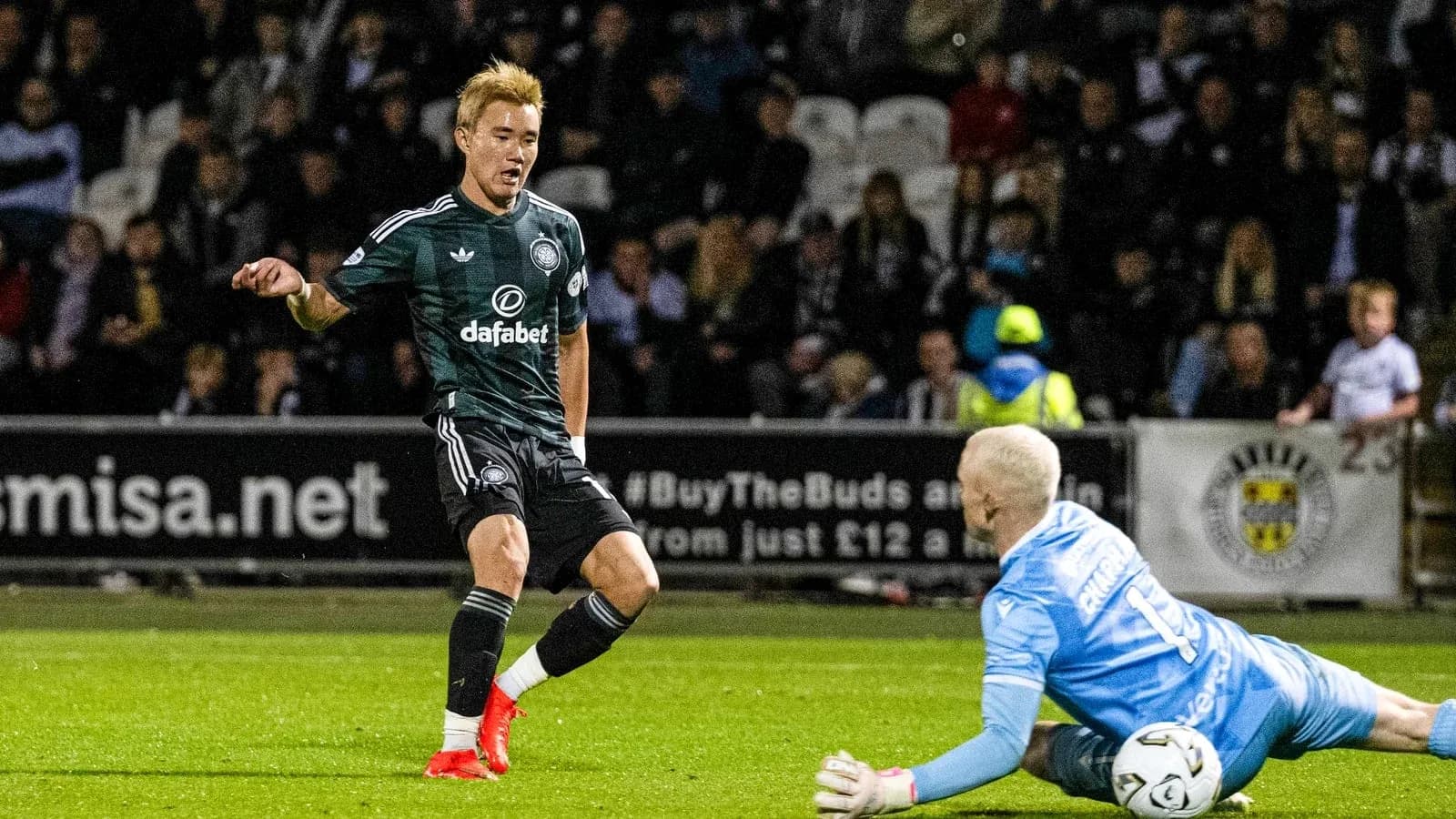 Player attempting to score against the goalkeeper