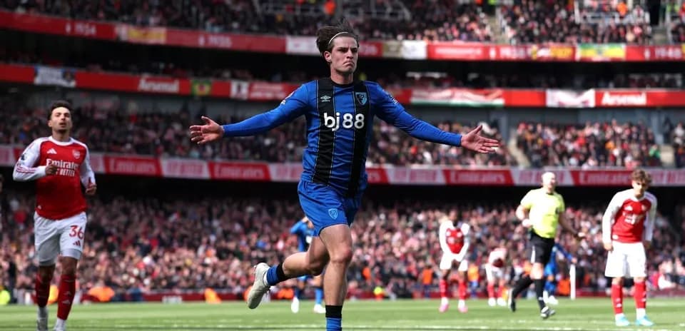 Bournemouth player celebrating a goal against Arsenal