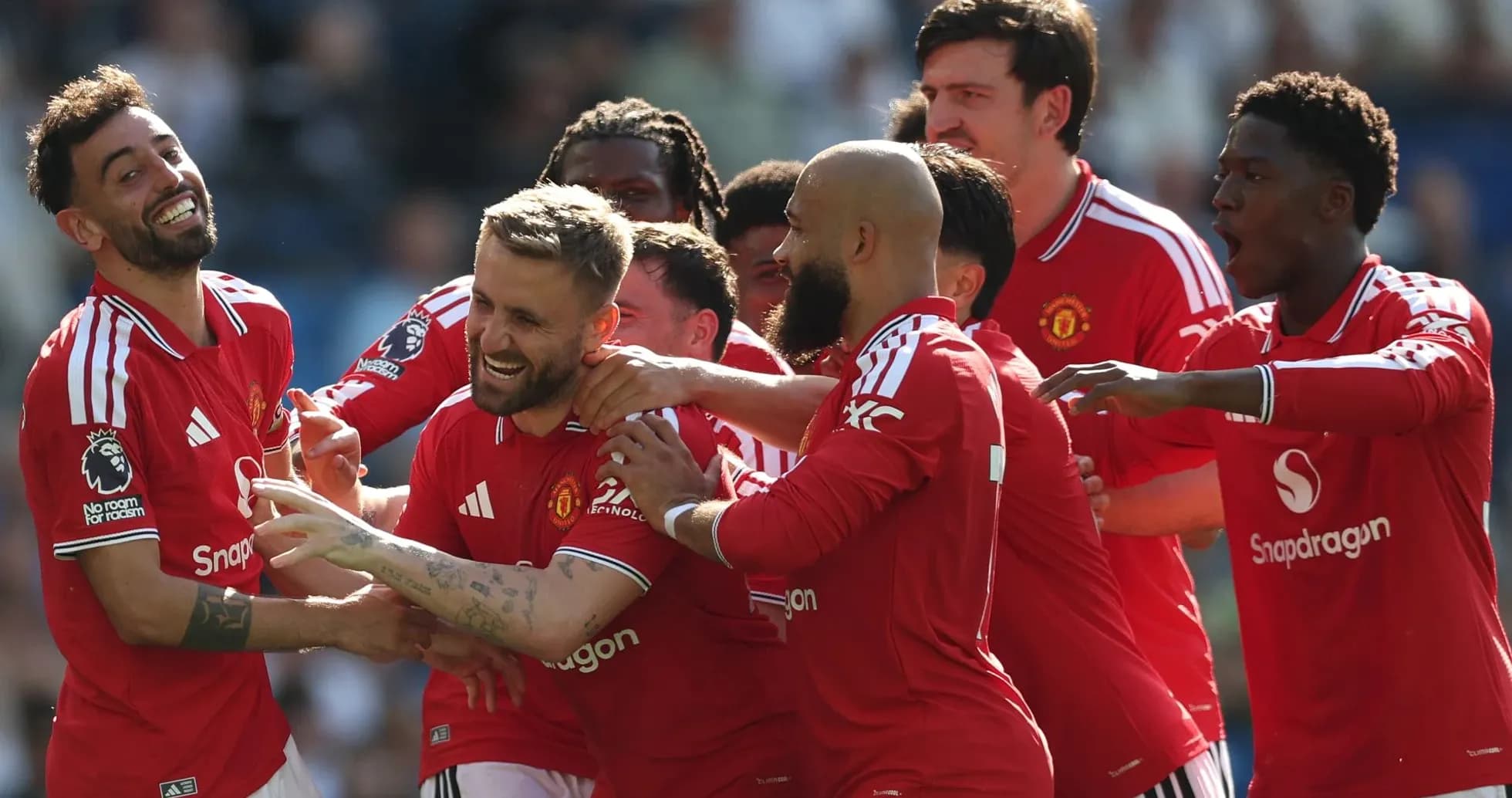 Manchester United players celebrating a goal together