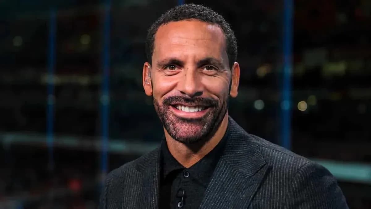 Analyst smiling in studio during broadcast