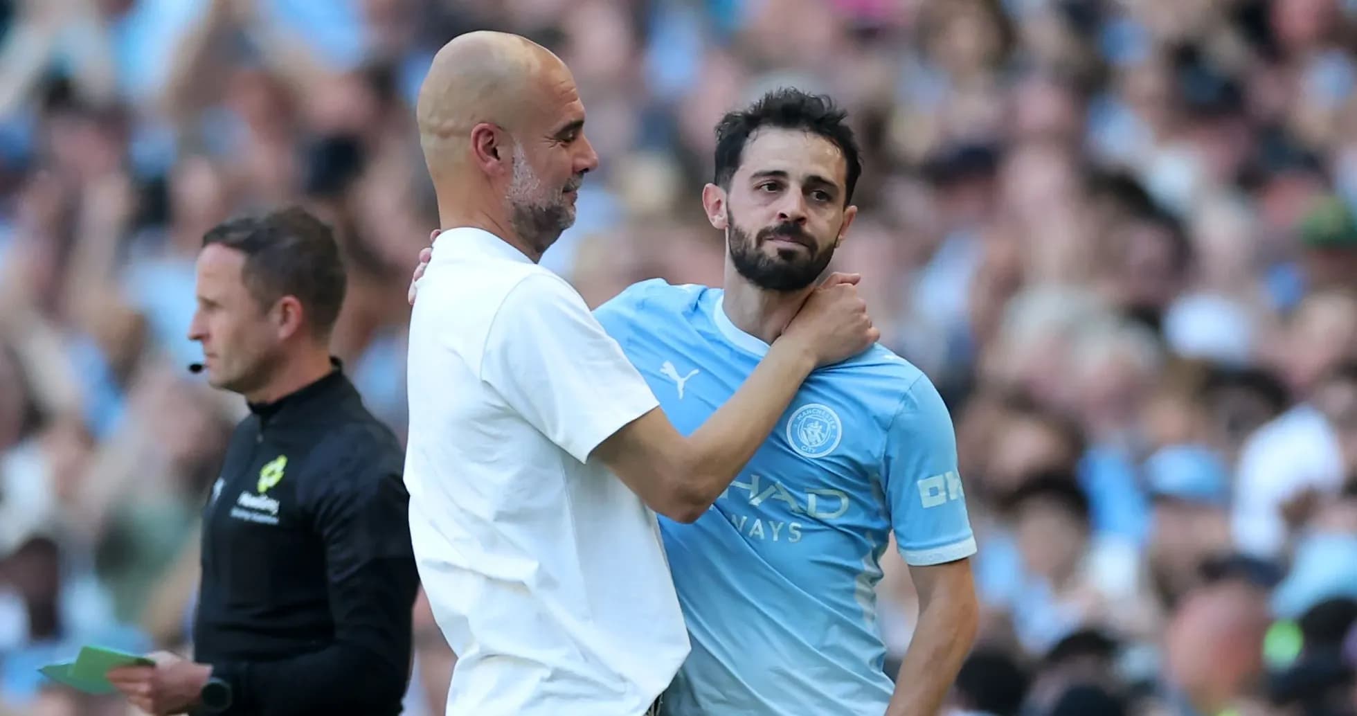 Pep Guardiola embraces Bernardo Silva during match