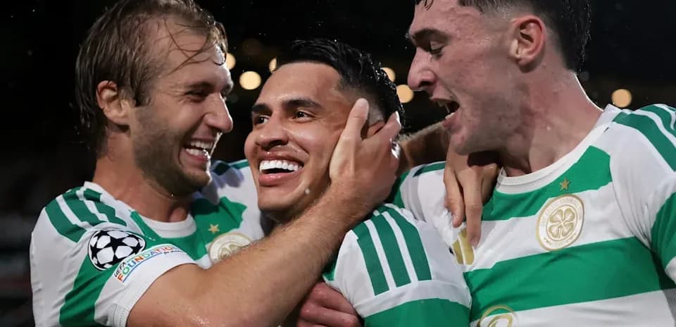 Celtic players celebrating after scoring a goal