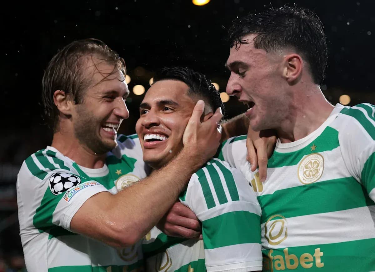 Celtic players celebrating after scoring a goal