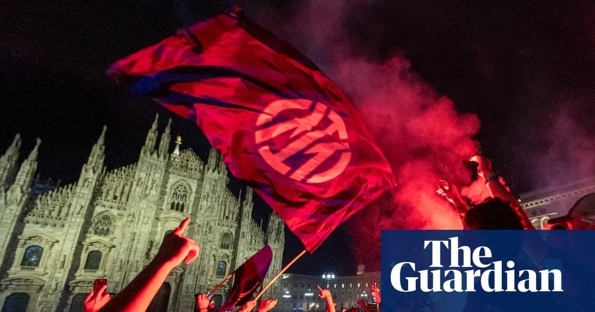 Fans waving flag during celebration at night