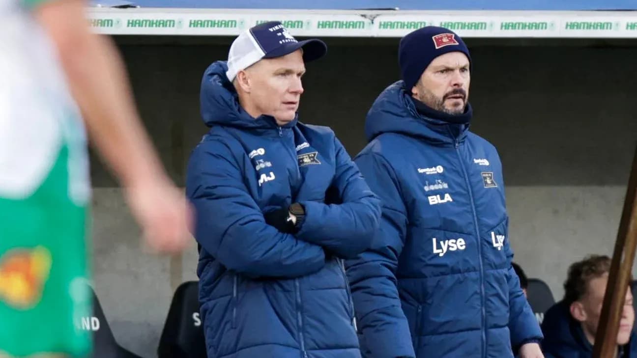 Coaches observing the match from the sidelines