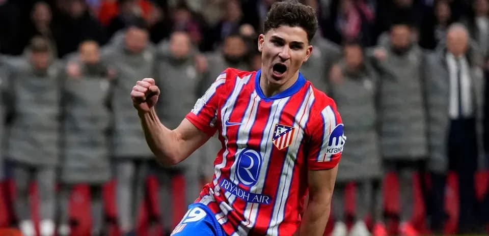 Atletico Madrid player celebrating after scoring goal
