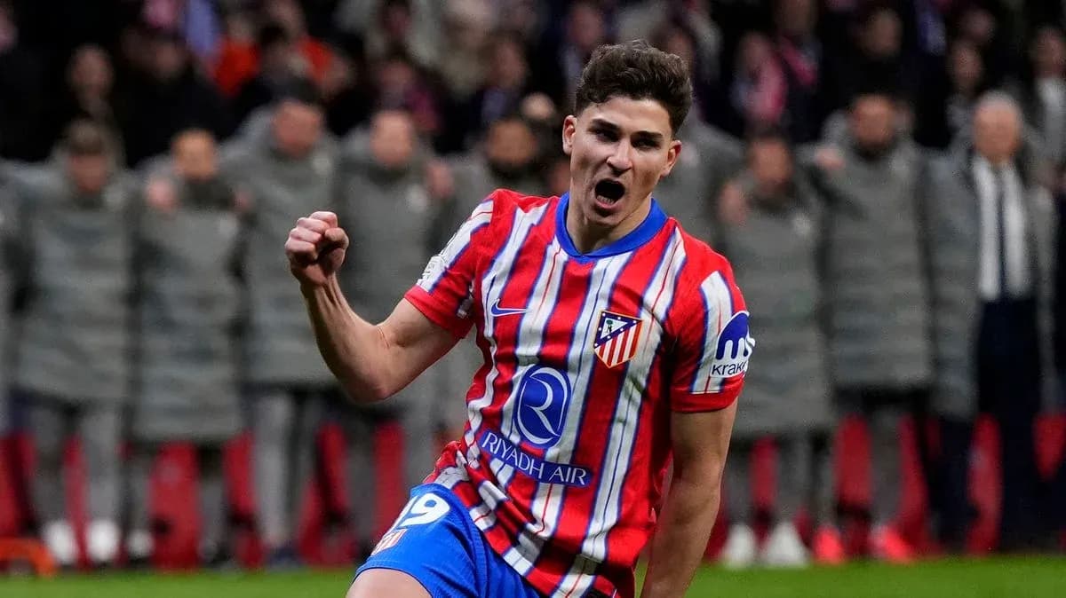 Atletico Madrid player celebrating after scoring goal