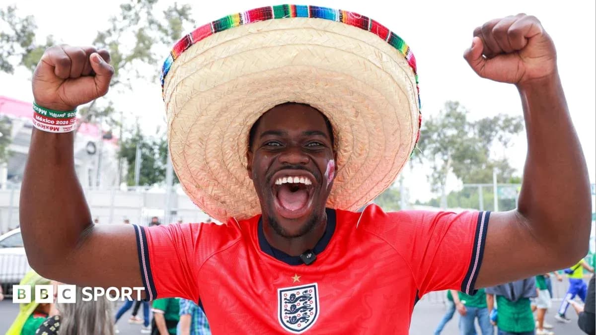 Fan celebrating in sombrero and England jersey
