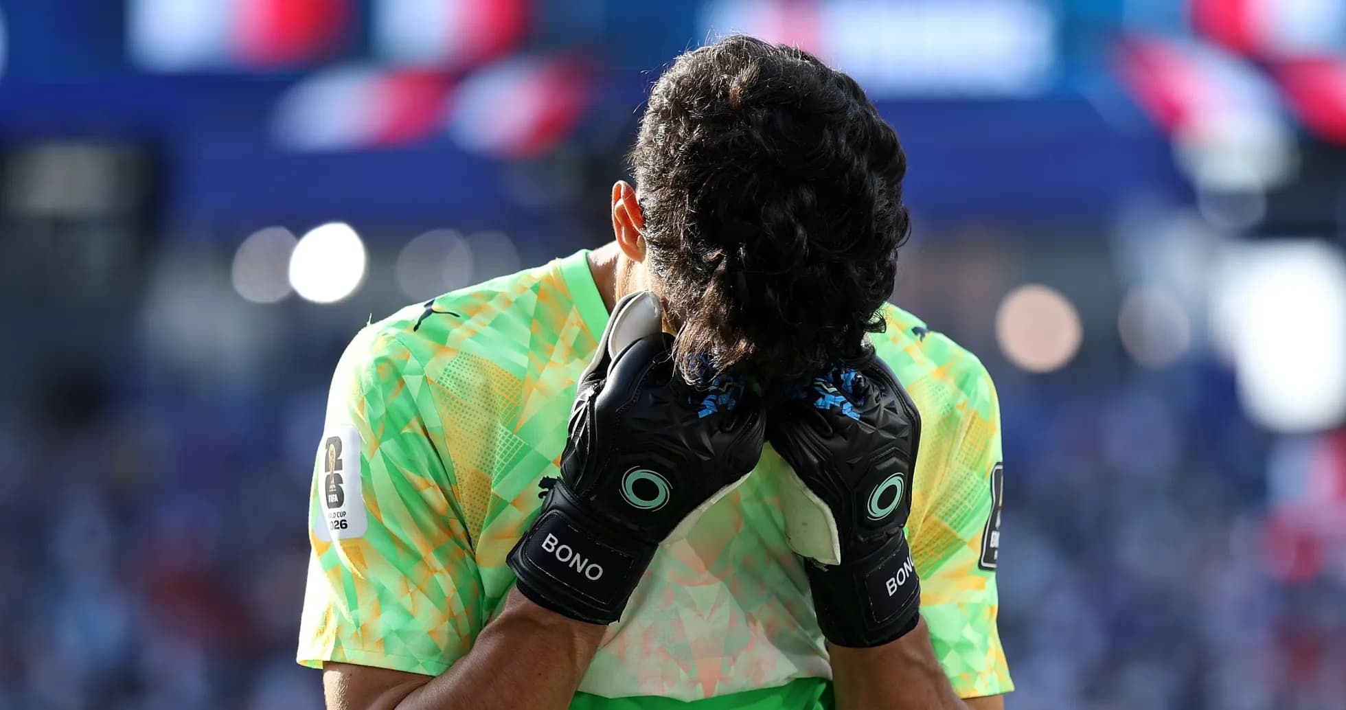 Goalkeeper with hands on head during match
