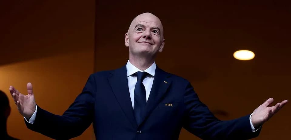 FIFA president speaking at event with open arms