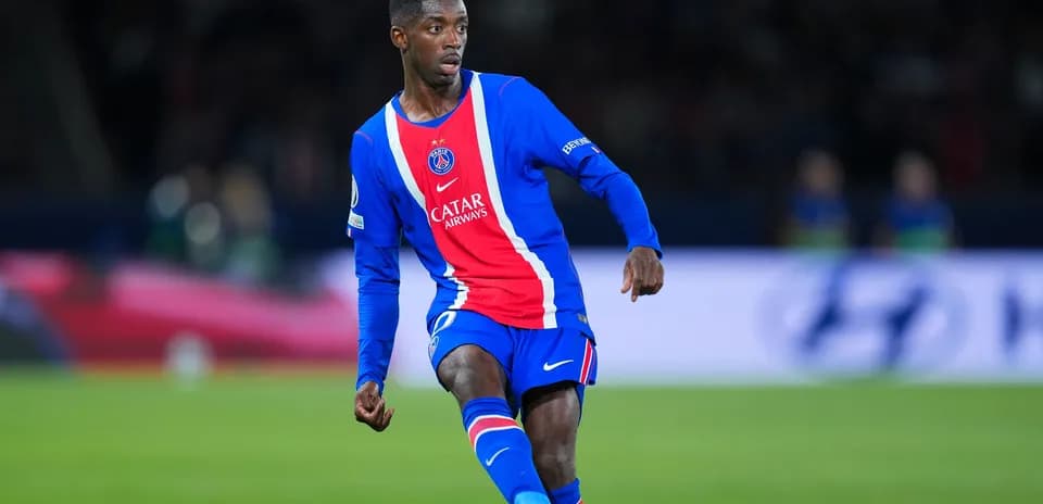 PSG player dribbling the ball on the field