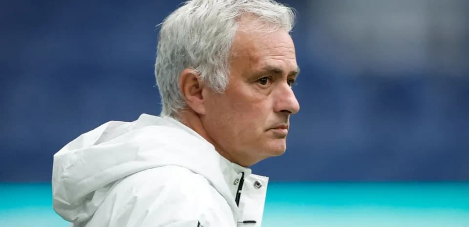 An experienced coach observing the training session