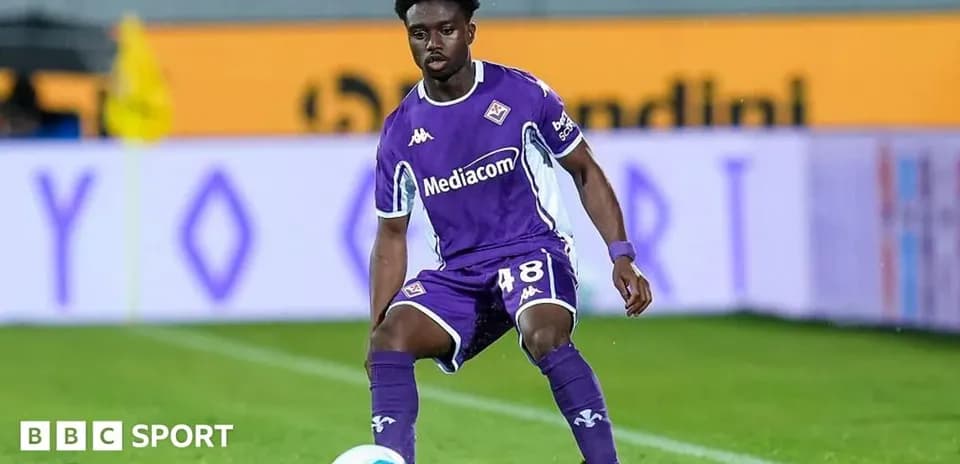 Fiorentina player in purple kit during match