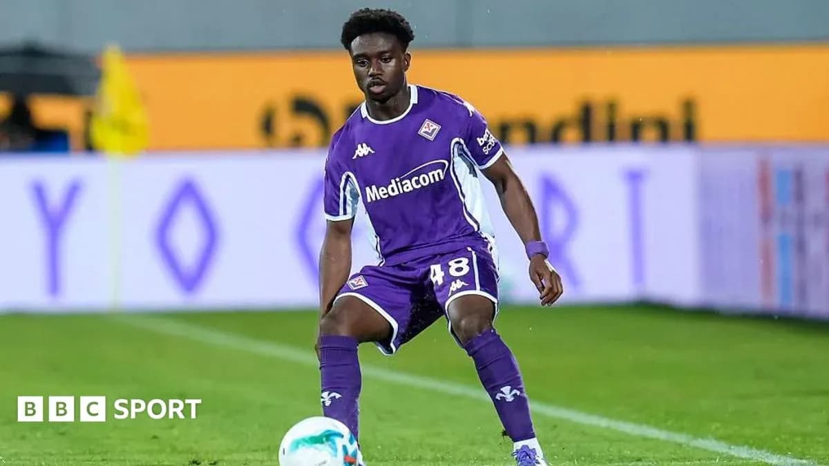 Fiorentina player in purple kit during match