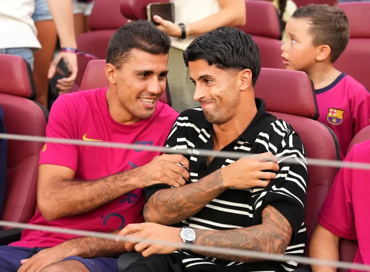 Two players interacting in seats at stadium