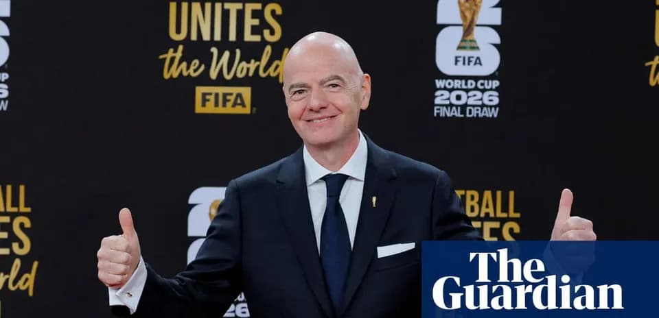 FIFA official posing at World Cup draw event