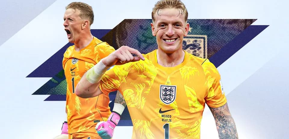 Goalkeeper celebrating in bright orange kit