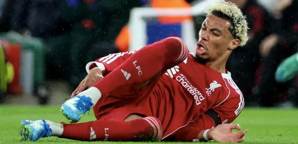 Liverpool player on ground after falling during match