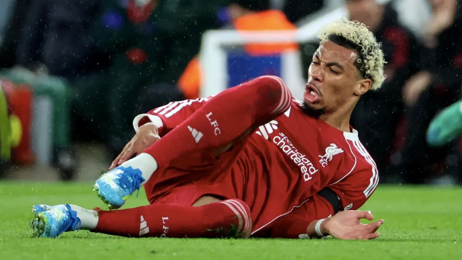 Liverpool player on ground after falling during match