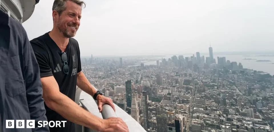 Man enjoying city view from tall building