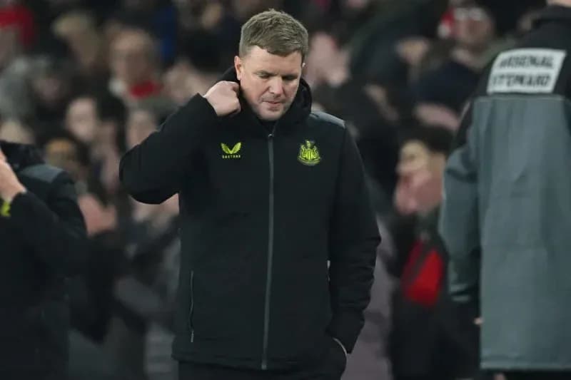 Manager walking off the pitch after match