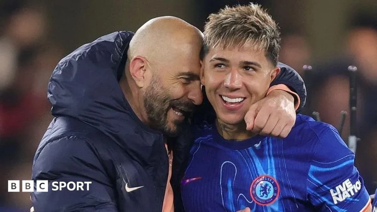 Two football players celebrating after a match