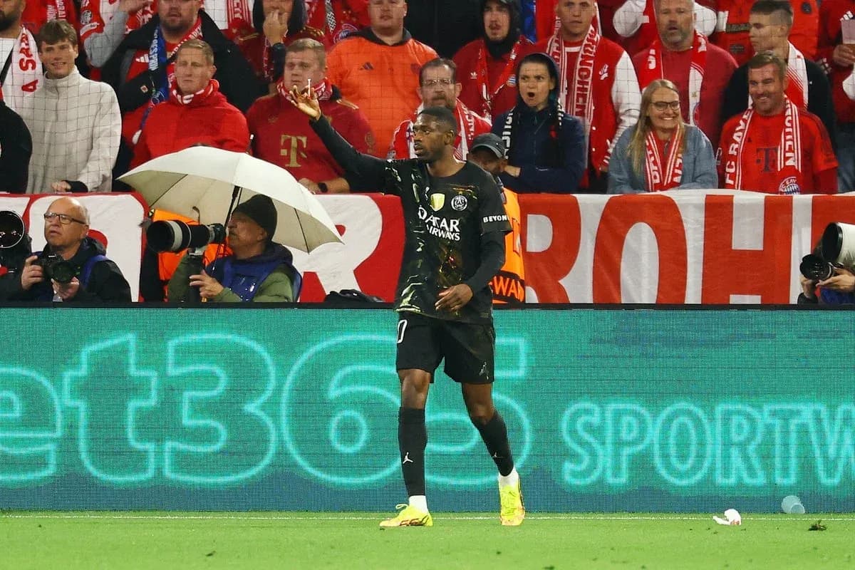Goalkeeper gesturing to fans during match