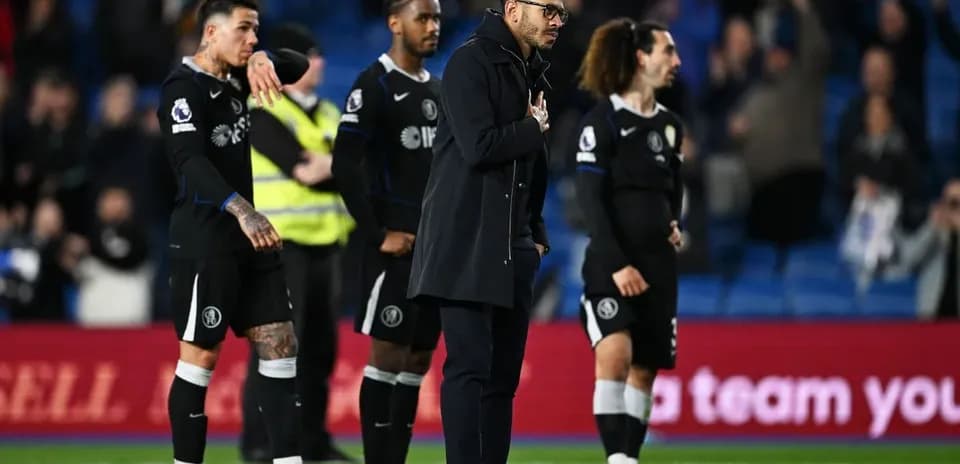 Football team acknowledging fans after the match