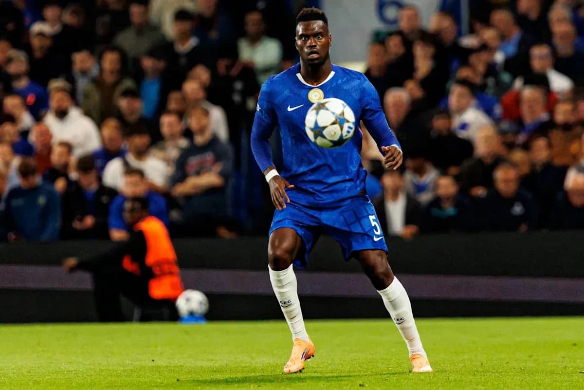 Player in blue jersey controlling ball during match