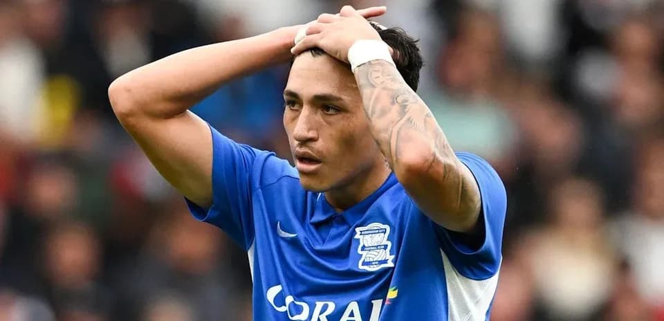 Birmingham City player expressing frustration on field