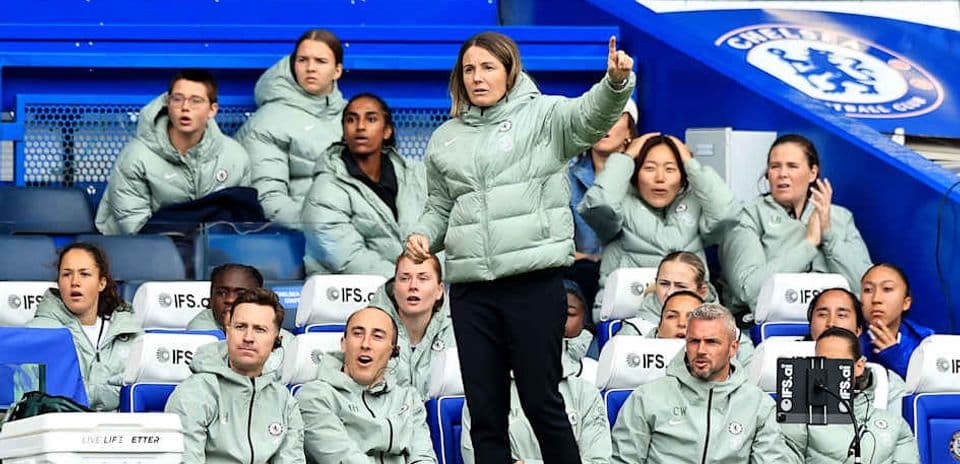 Head coach directing players from the sidelines
