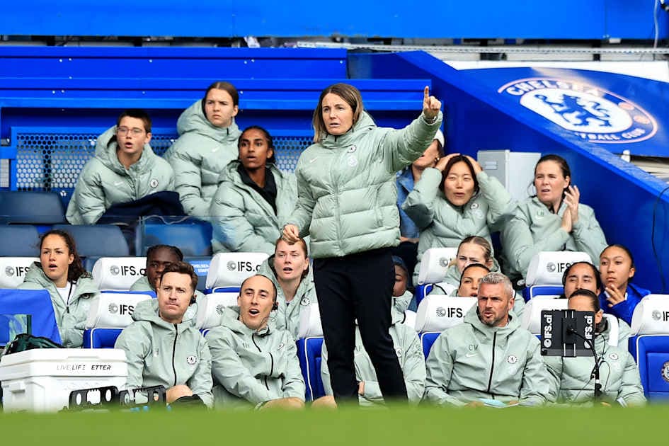 Head coach directing players from the sidelines