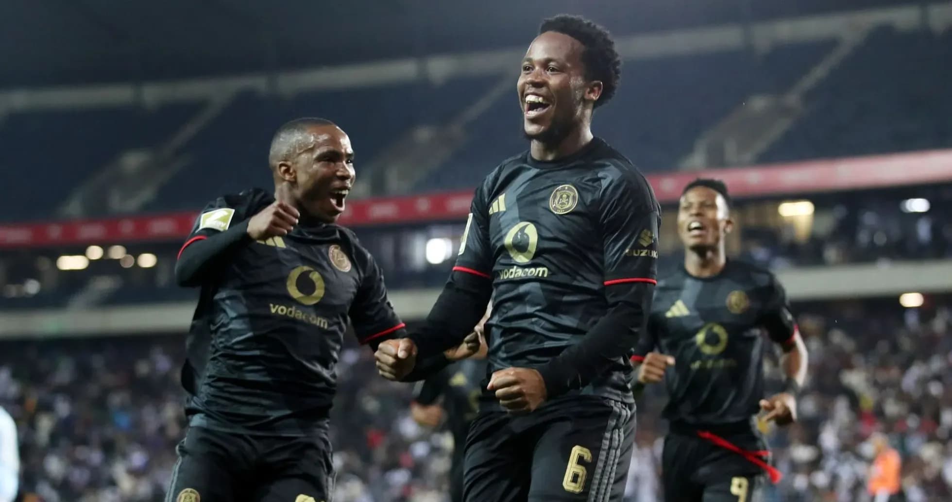 Orlando Pirates players celebrating a goal together
