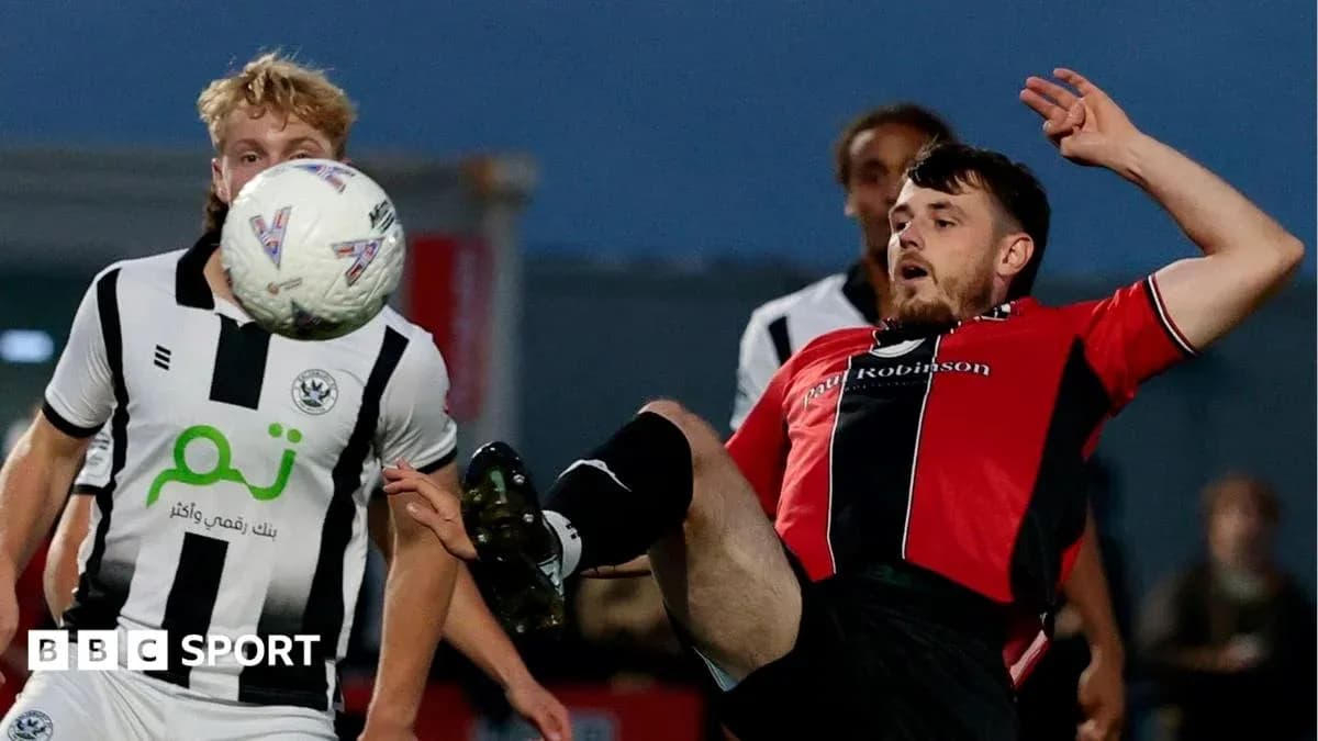 Player attempting to kick ball during match