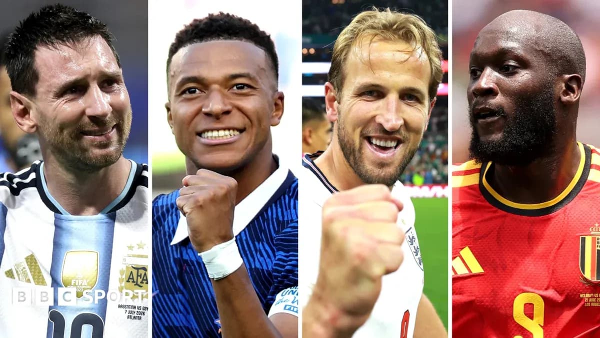 Four football players celebrating with clenched fists