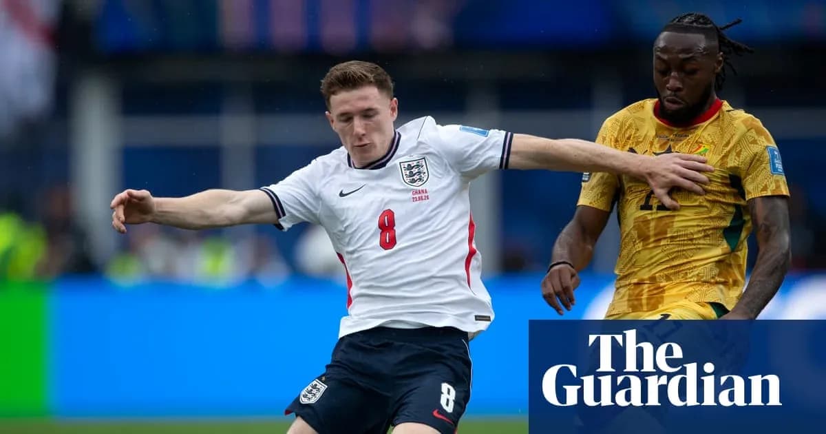 England player tackling Ghana player during match