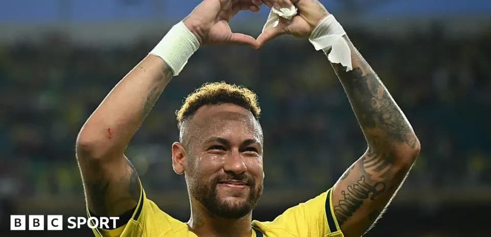 Neymar celebrating and making heart gesture