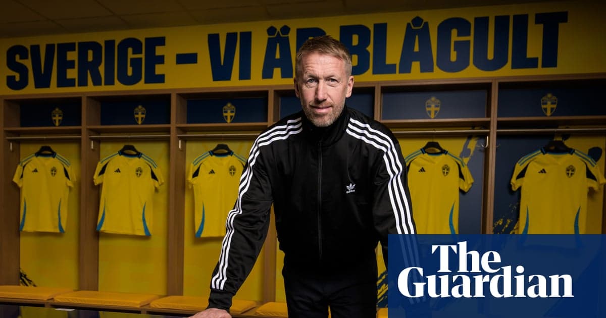 Coach standing in front of Sweden national team jerseys