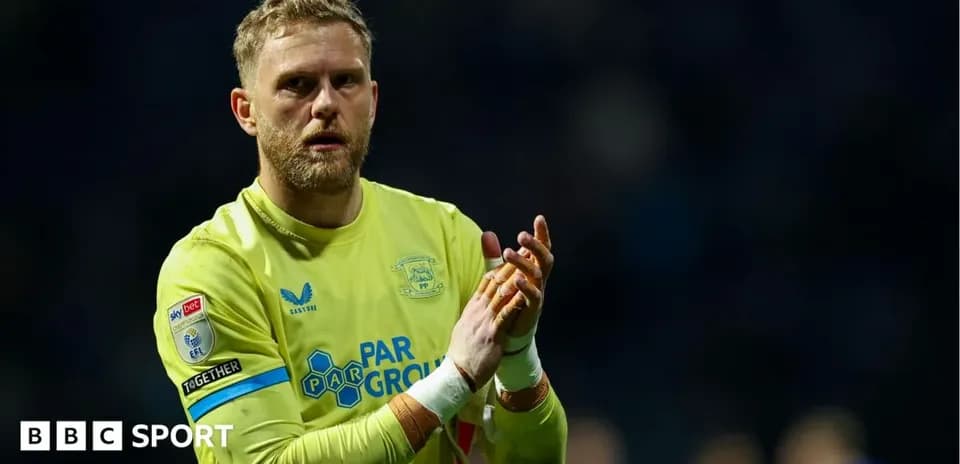 Goalkeeper applauding fans after the match