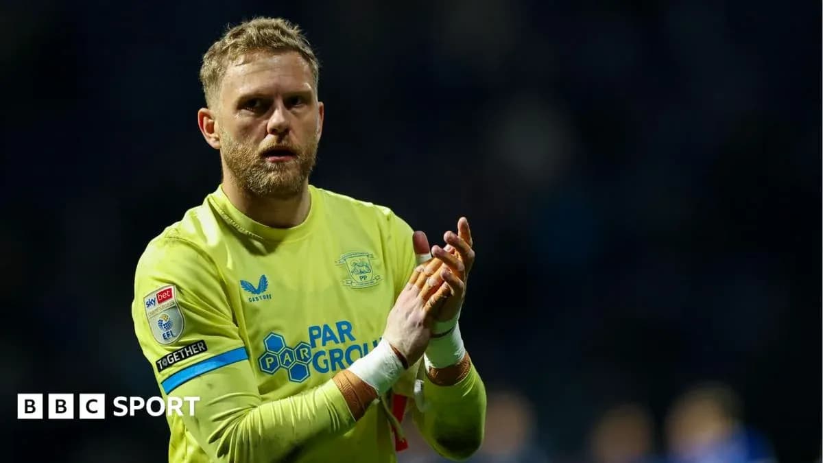 Goalkeeper applauding fans after the match