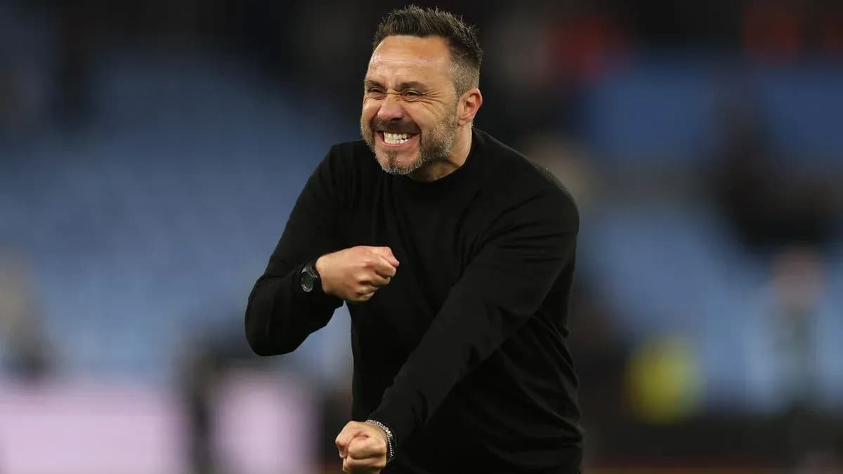 Coach celebrating passionately during a match