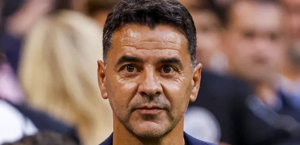 Football manager observing the match from sidelines